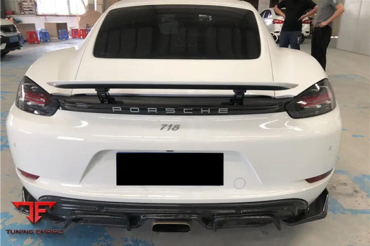PORSCHE 718 CAYMAN & BOXSTER AM STYLE CARBON FIBER REAR LIP WITH CAPS BSD