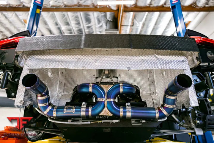 PORSCHE CARRERA GT FORGED WHEELS AND EXHAUST SYSTEM